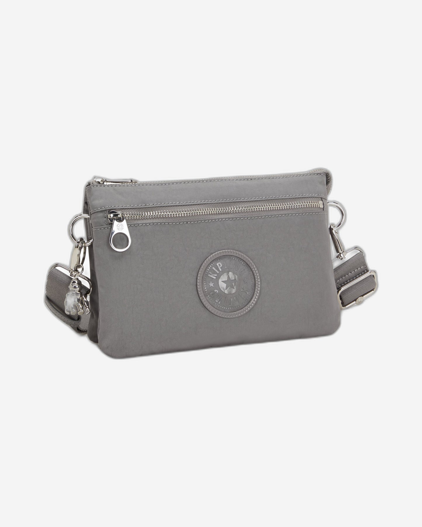 حقيبة كروس صغيرة Kipling Riri Zip باللون الرمادي Spice (مع حزام كتف قابل للإزالة) I3302-4GV