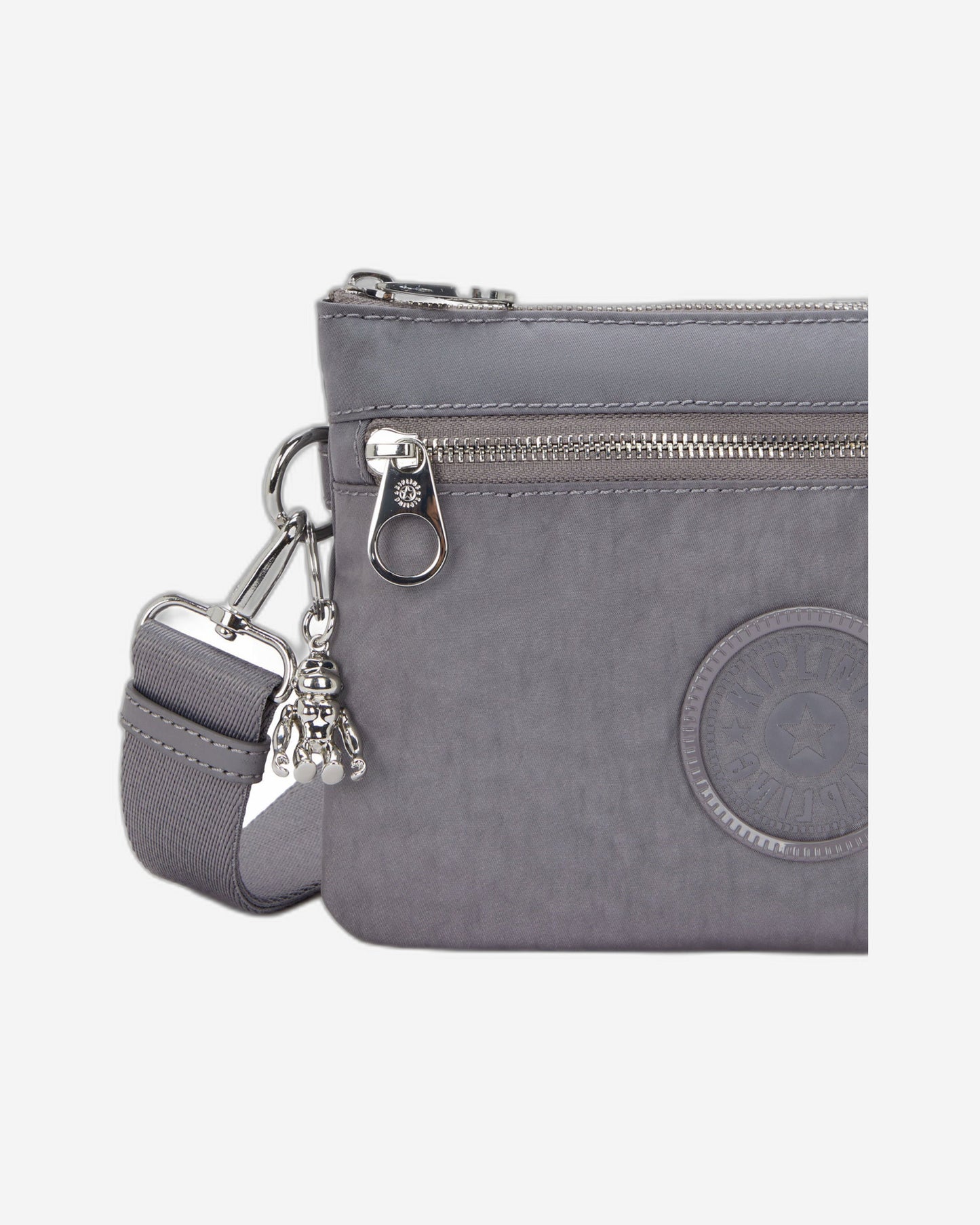 حقيبة كروس صغيرة Kipling Riri Zip باللون الرمادي Spice (مع حزام كتف قابل للإزالة) I3302-4GV