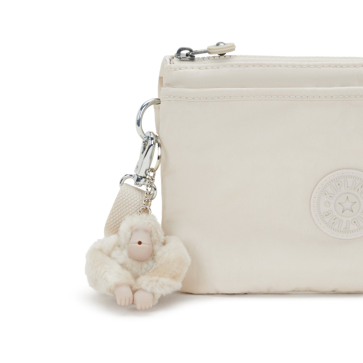 حقيبة كروس صغيرة Kipling Riri Hideaway باللون البيج I7590-7JR